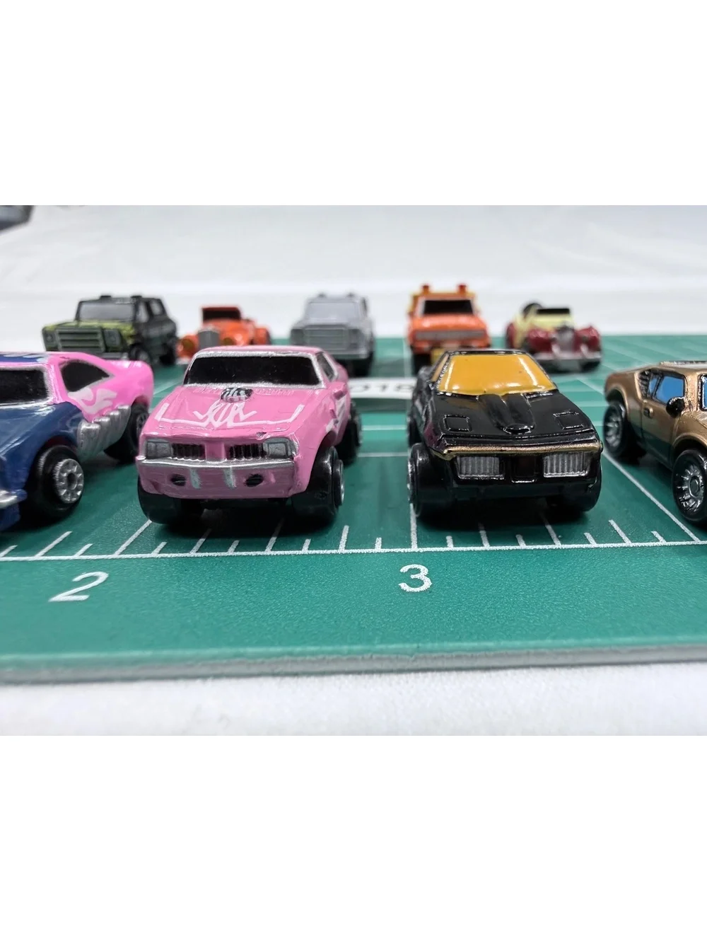 Set of 11 Vintage Galoob 1986-1987 Toy Cars with Various Designs and Colors